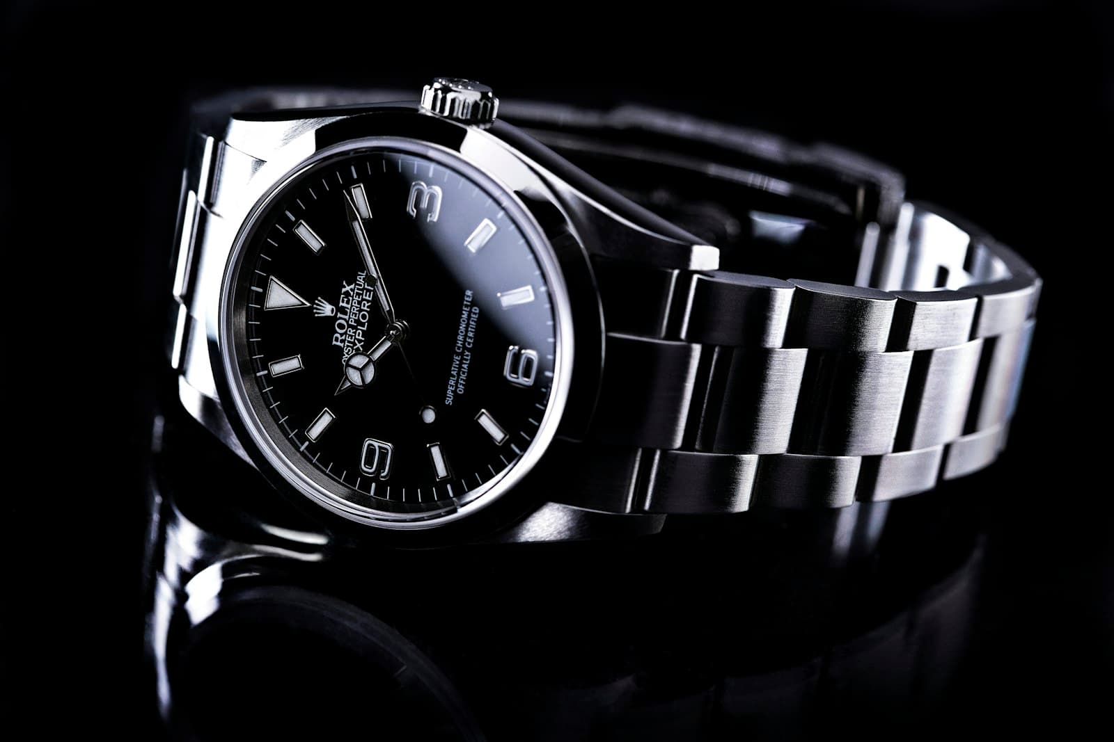 Close-up of a luxury watch case and dial under review lighting