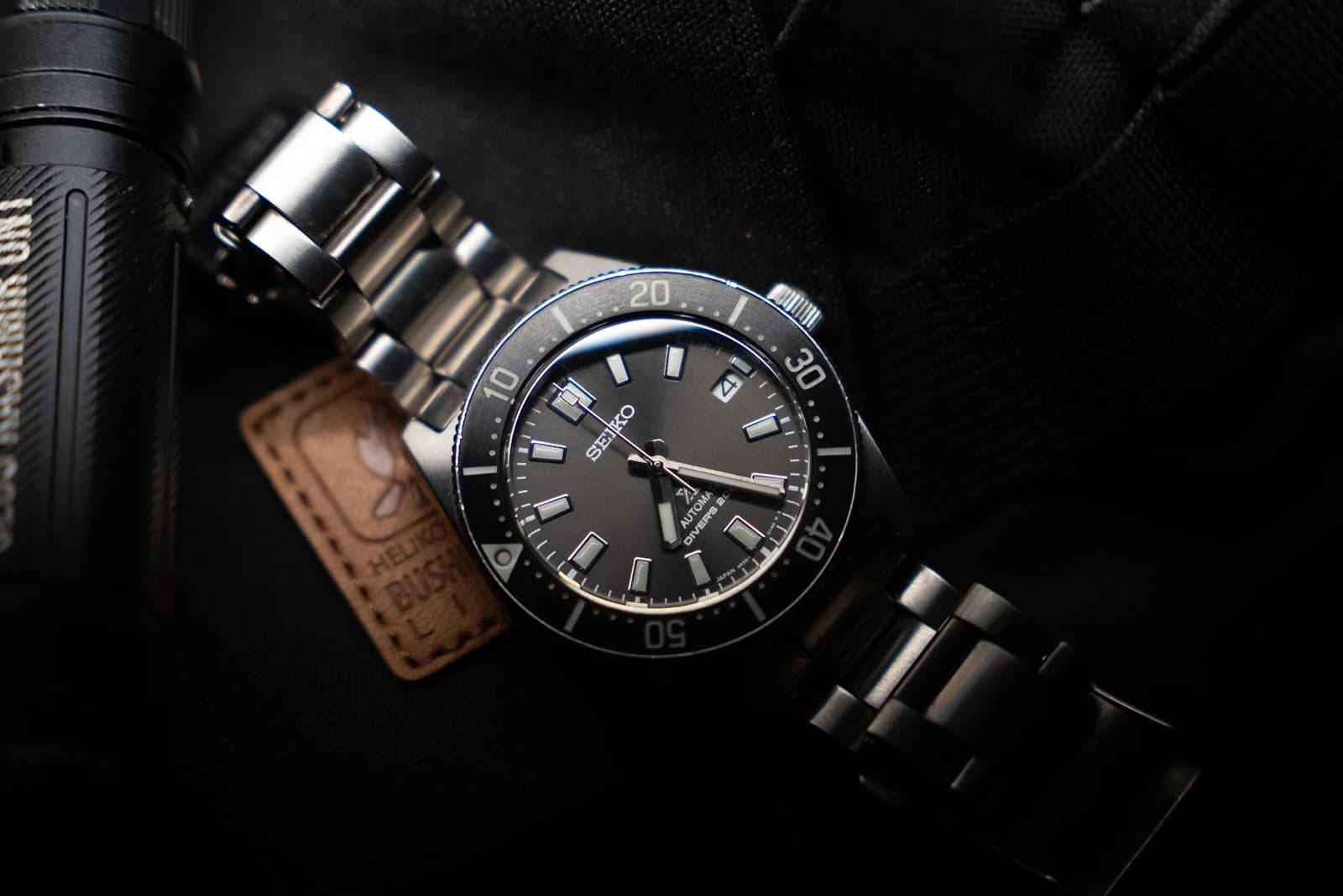 Close-up of a wristwatch on a dark background