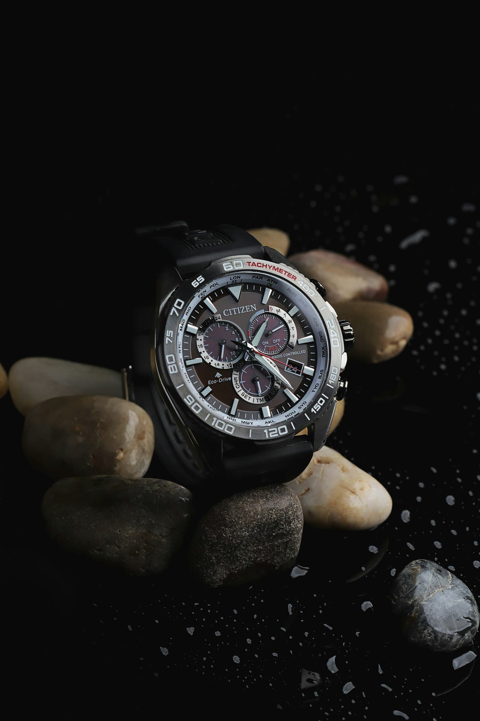 Luxury watch on a dark surface prepared for auction photography